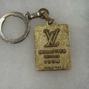 RARE Louis Vuitton Malletier 1854 keychain. W COA